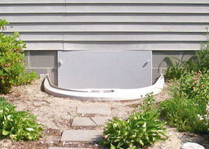 Rigid plastic crawl space access well installed in a Cambridge crawl space