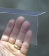 Closeup of a clear plastic covering on a Malden crawl space block wall