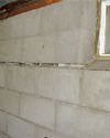 Severely buckling foundation walls in a home in Everett in need of repairs.