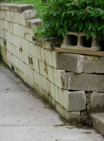 collapsing retaining wall with severe damage in Marlborough