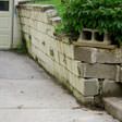 a collapsing retaining wall in Pembroke