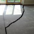 a huge crack in a concrete slab floor in Cambridge