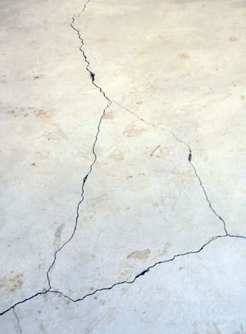 severely cracked, heaving slab floors in a home in Andover