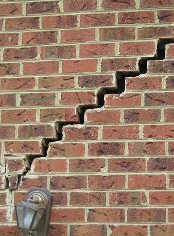 major cracking of a brick foundation wall in Lexington