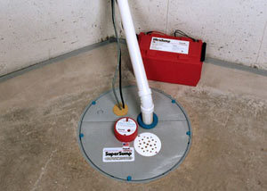 A sump pump system with a battery backup system installed in Marlborough